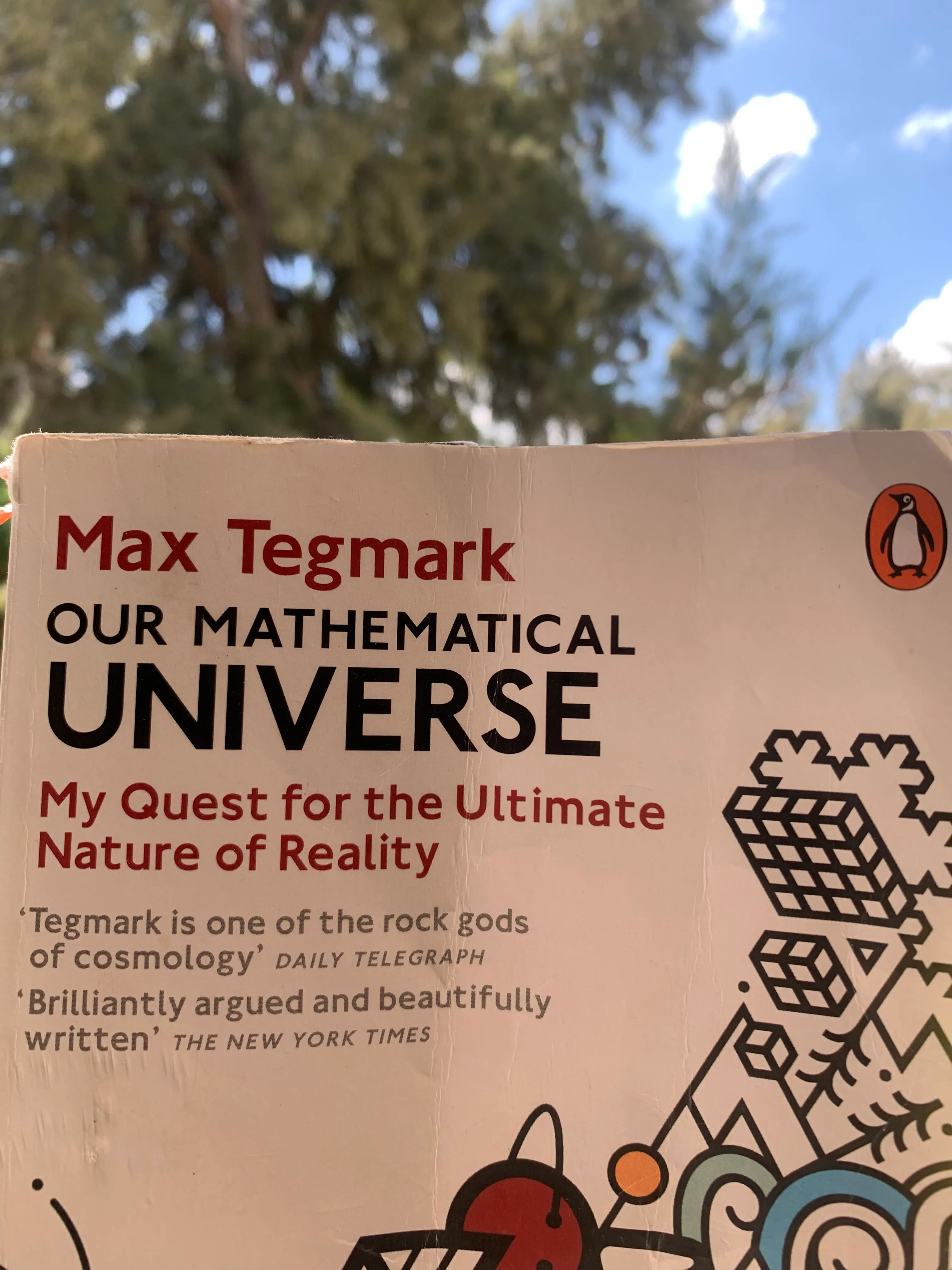 The book cover of "Our Mathematical Universe"